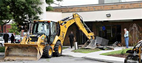 Thieves Use Backhoe For Bank Heist Cops