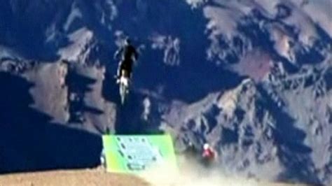 Daredevil Base Jumper Rides Motorbike Off Mountain Bbc News