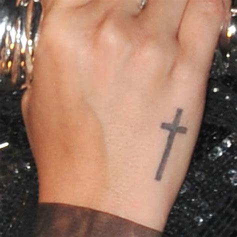 Demi Lovato Cross Side of Hand Tattoo | Steal Her Style