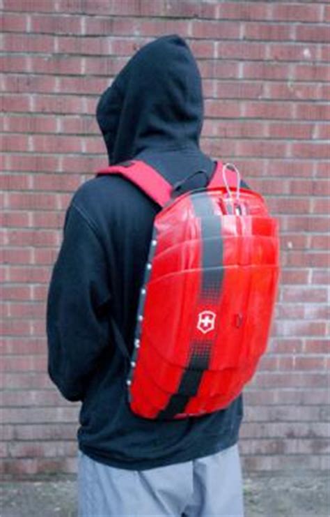 Hard shell backpack with locking system | Industrial Designers Society ...