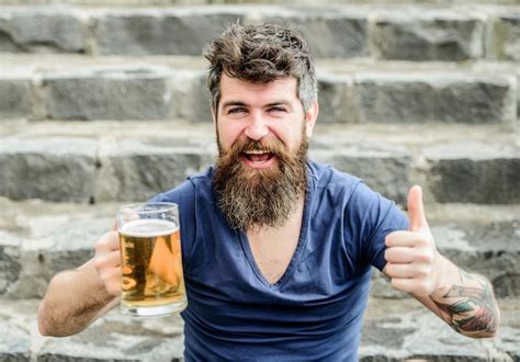 Premium Photo Brutal Male Needs Refreshment Bearded Man With Beer