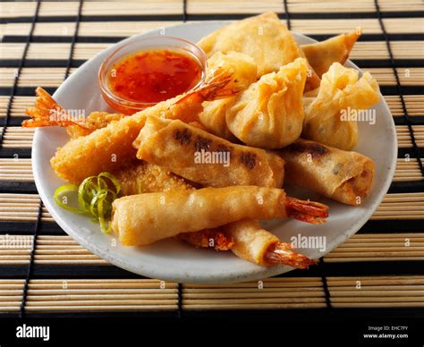 Cooked Mixed Chinese Starters Dim Sum Breaded Prawns Spring Rolls