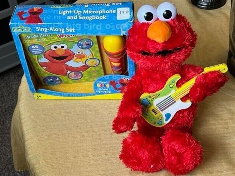 Sesame Street Sing Along Book Nursery Rhymes with ELMO 20 Songs on ...