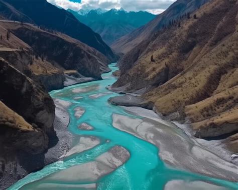 Premium Ai Image A River In The Mountains With A Blue River In The