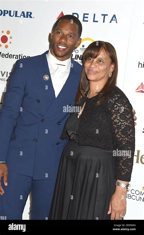 Victor Cruz And His Mother Blanca Cruz Attend The Hispanic Federatons