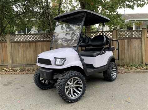 Lifted White Alpha Precedent Big Thunder Golf Carts