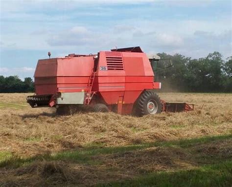 Massey Ferguson 38 Combine Harvester Turning Hay Norfolk England