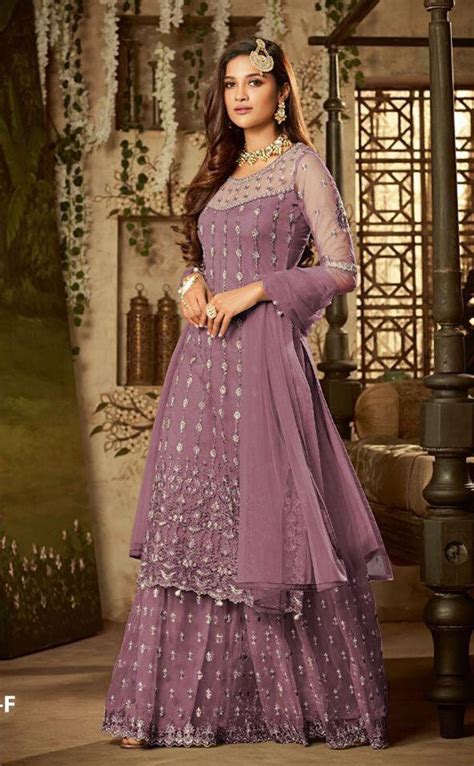 Mesmerizing Purple Color Heavy Net Embroidered Stone Work Sharara Suit