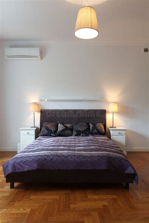 Purple bed stock image. Image of cosy, huge, estate, chandelier - 27171291