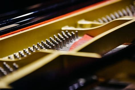 Premium Photo | Detail of the interior of a piano with the soundboard ...