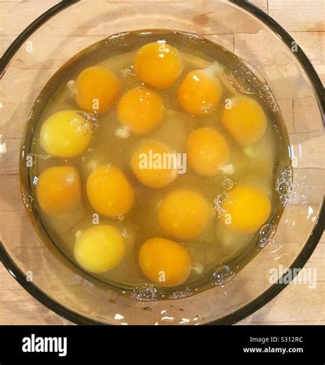 Egg Yolks In Glass Bowl Stock Photo Alamy