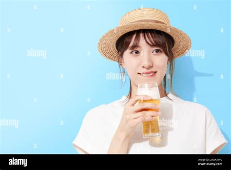 Young Japanese Woman Drinking Beer Stock Photo Alamy