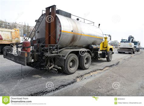 Road Repair With A Big Tar Machine Filling Seams Machines For Road