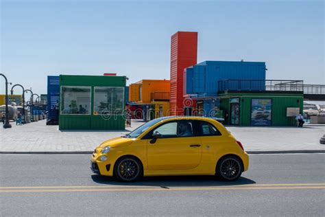 Front View Of Yellow Fiat 500 Abarth 595 Parked In The Street Editorial