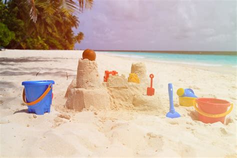 Sand Castle on Beach and Kids Toys Stock Image - Image of creativity, summer: 59078109