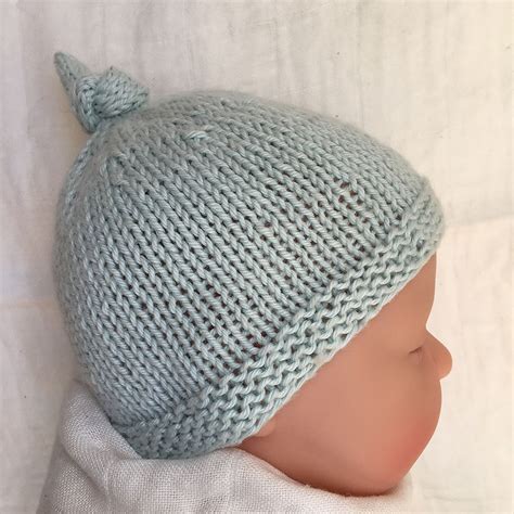 Ravelry: Baby Hat with Top Knot - Tegan by Julie Taylor Baby Hat Knitting Patterns Free, Baby ...