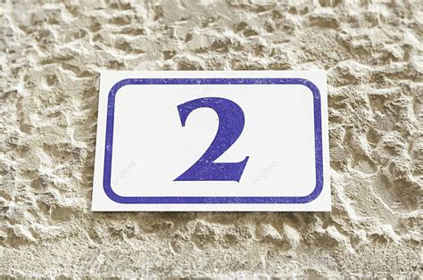 Number Two On A Wall Type Sign Light Photo Background And Picture For ...