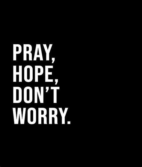 The Words Pray Hope Don T Worry Are White On Black