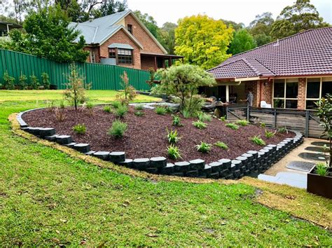 Retaining Wall Ideas For Sloped Backyards Levelling A Sloped Block