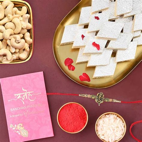 Send Sneh Rustic Ganesha Rakhi With Kaju Katli Cashews Online