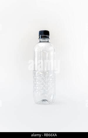 An Empty Generic Single Use Plastic Water Bottle On A White Background