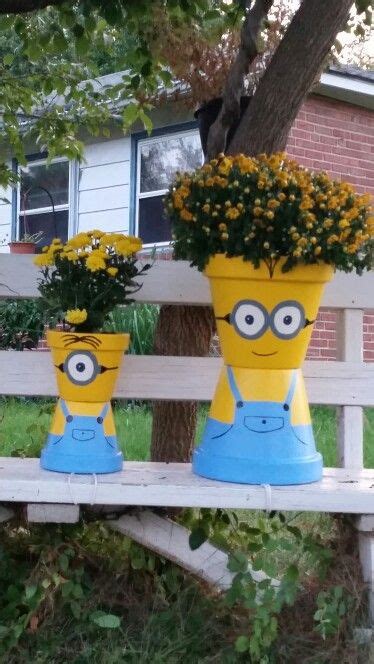 I Made Flower Pot Minions Today Clay Flower Pots Flower Pot Art Flower Pot Crafts