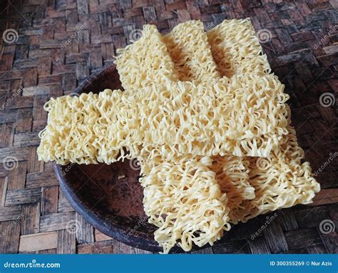 Raw Instant Noodles On Woven Bamboo Background Raw Instant Noodles