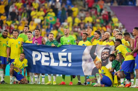 Brazil stars carry Pele poster on to pitch and pose for touching ...