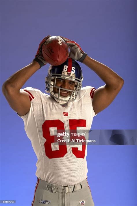 Portrait Of New York Giants David Tyree With Football Stuck On His