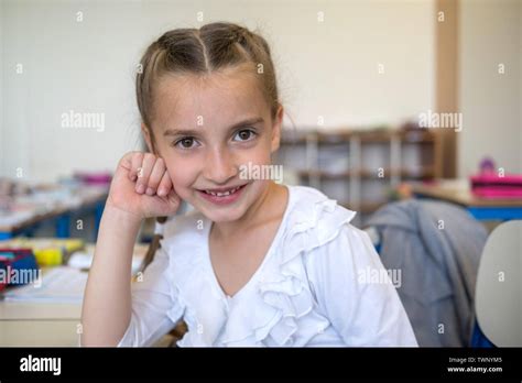 Pretty Elementary School Girl Posing At Camera Stock Photo Alamy