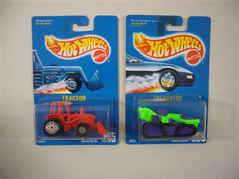 LOT OF 2 1991 HOT WHEELS 145 TRACTOR RED 205 TREADATOR EBay