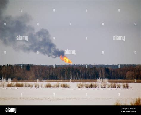 Burning gas flare Stock Photo - Alamy