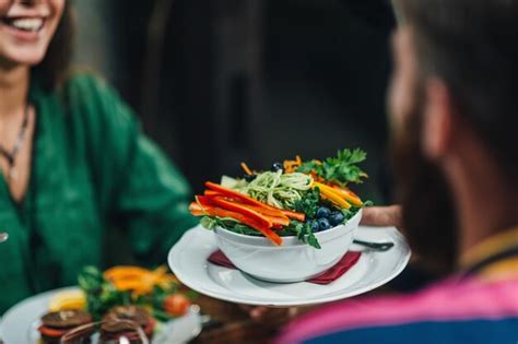 Premium Photo Horizontal Image Of Male Hand Serving Plate Of