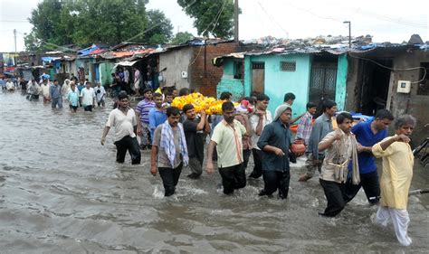 Flooding Forces Thousands To Flee Their Homes In Indian State Of