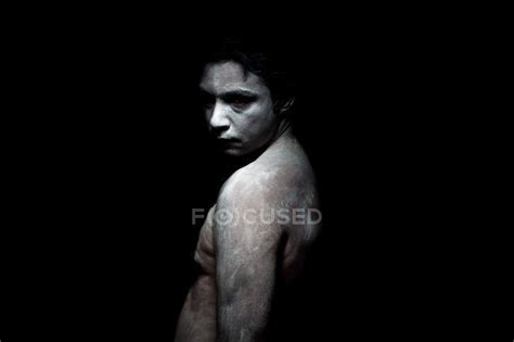 Naked Man Covered By White Paint Looking At Camera Male Barechested Stock Photo