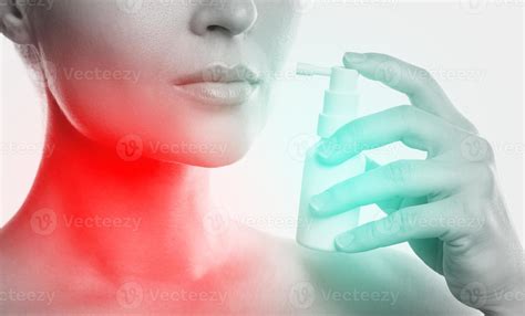 Woman is using spray for sore throat relief 16293156 Stock Photo at ...