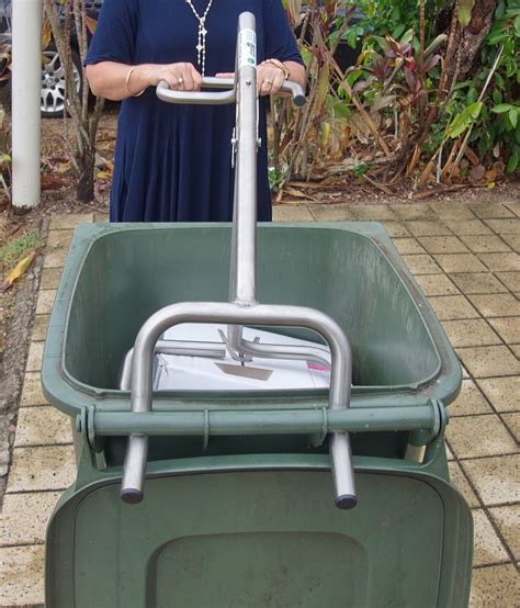 The Wheelie Squisher Safely Compact Your Overloaded Wheelie Bin