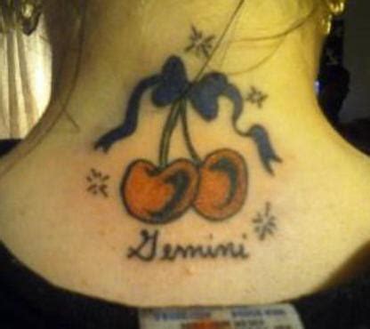 best tattoo gallery: Bow and Cherry Tattoo on back of Neck