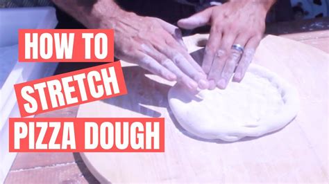 How To Stretch Pizza Dough Youtube