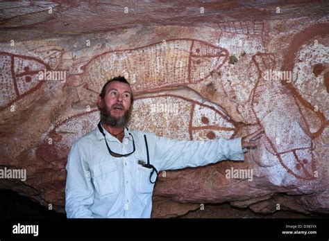 Aboriginal Rock Art Depicting Wandjina Paintings On A Cave Ceiling At