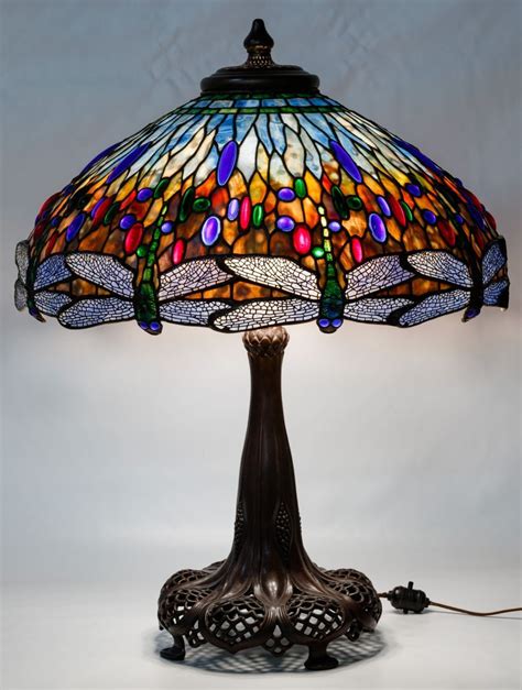 Lot 70 Tiffany Style Dragonfly Stained Glass Shade Table Lamp Having A Bronze Base With Six