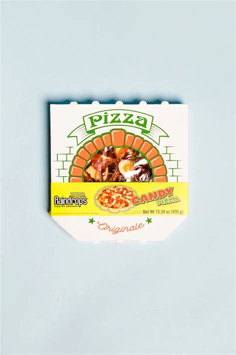 a pizza box with an image of two people in the oven on top of it