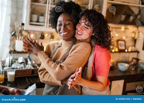 Happy Lesbian Lgbtq Couple In Love Cuddling Laughing Having Fun