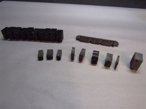 Collection of Vintage Metal Printing Press Stamps (G) | EstateSales.org