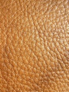 Semi-aniline - www.leather-dictionary.com - The Leather Dictionary