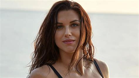 Our 8 Favorite Photos Of Alex Morgan Playing Soccer On The Beach In St