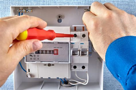 Installing of an Energy Meter and Circuit Breakers Stock Photo - Image ...