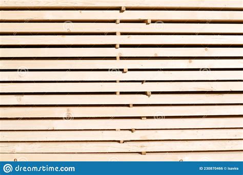 Background From Wooden Boards Close Up Stacked Stacks Of Wooden Planks