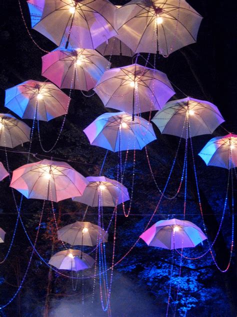 FIREFLY : Umbrellas at Night | Ivan Carlson & Associates