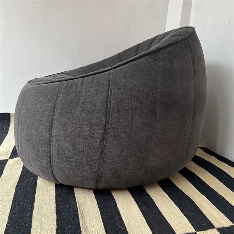 Ligne Roset Channel Tufted Ottoman Swivel Chair And Ottoman